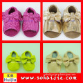 Guangzhou shenzhun export new arrival sweet color tassels sandals and bow cow leather used shoes wholesale with baby